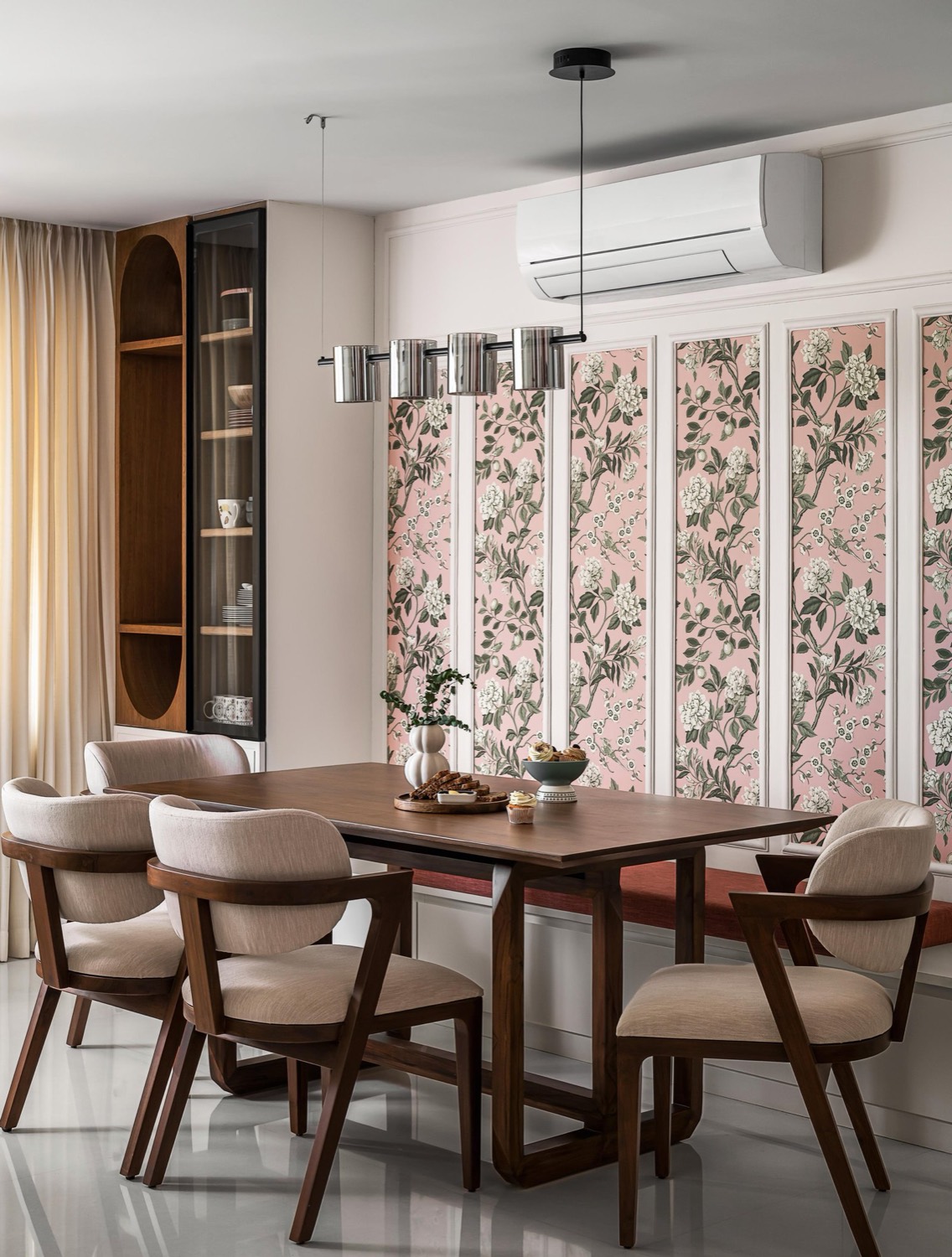 Dining room with walnut table and hand-painted botanical wardrobe panels